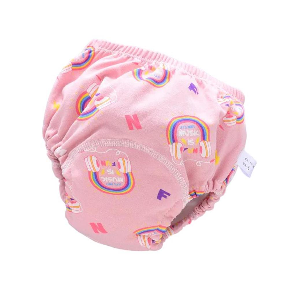 Toddler wearing a patterned reusable swim diaper during potty training and swimming lessons.