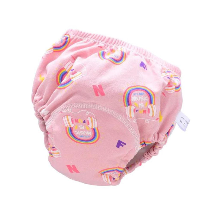 Toddler wearing a patterned reusable swim diaper during potty training and swimming lessons.