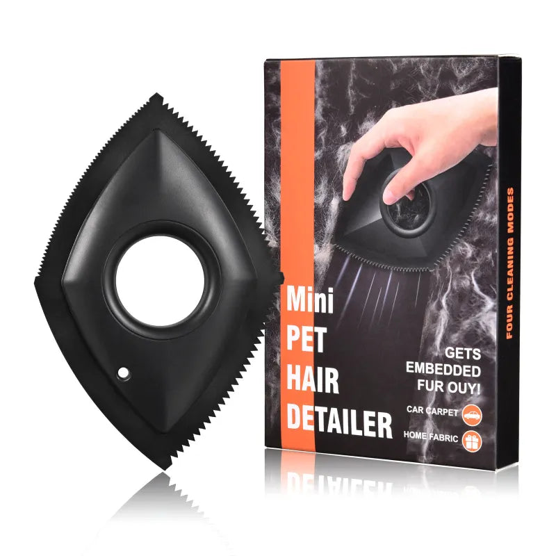 Black handheld pet hair remover for quick cleaning of car seats, carpets, and fabric. Essential for pet owners.