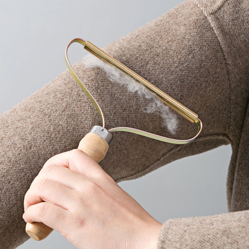 Reusable Eco-Friendly Pet Hair & Lint Remover Tool for furniture and clothes.