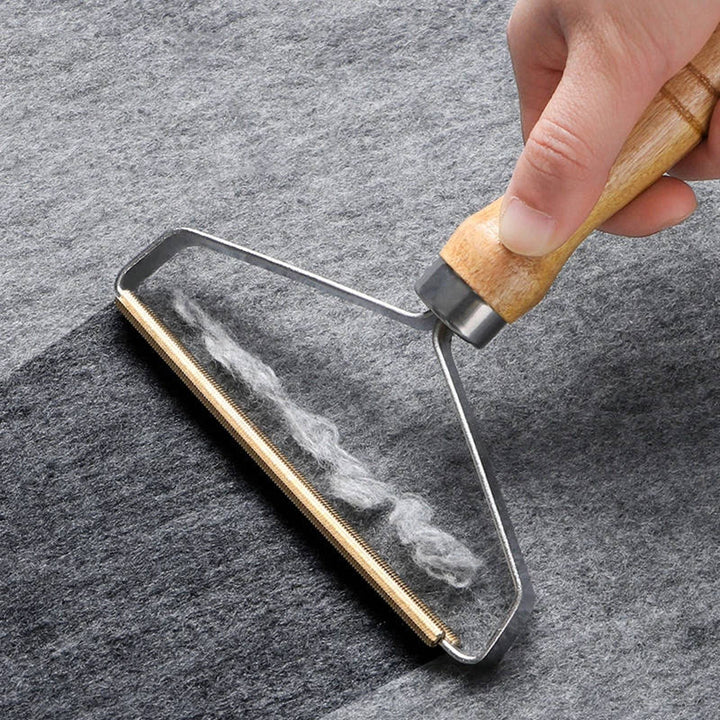 Effective fabric cleaner and pet hair remover tool, reusable and eco-friendly.
