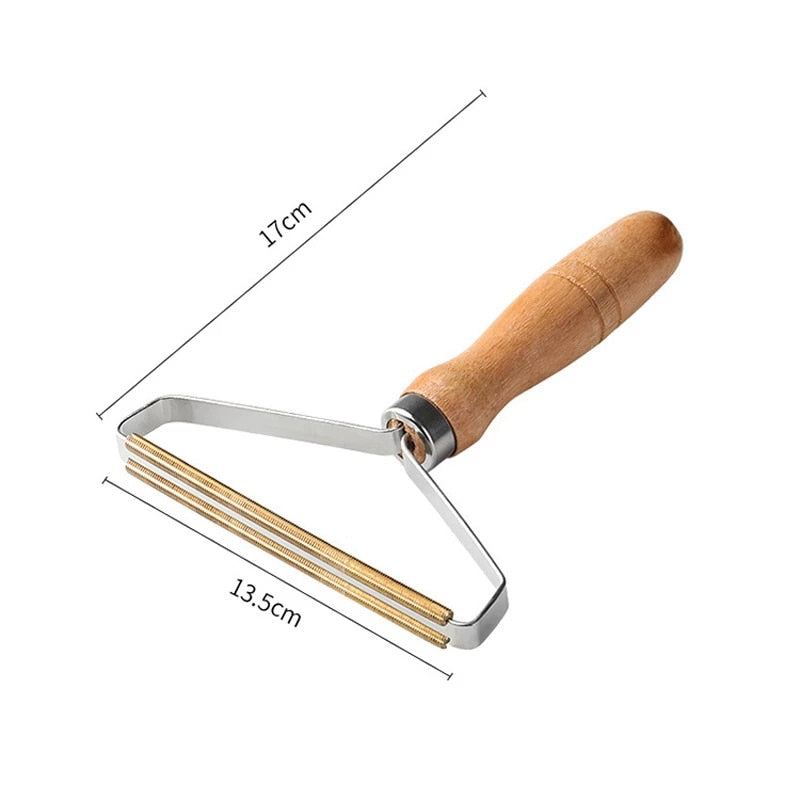Fuzz remover tool for upholstery, ideal for removing pet hair and lint.