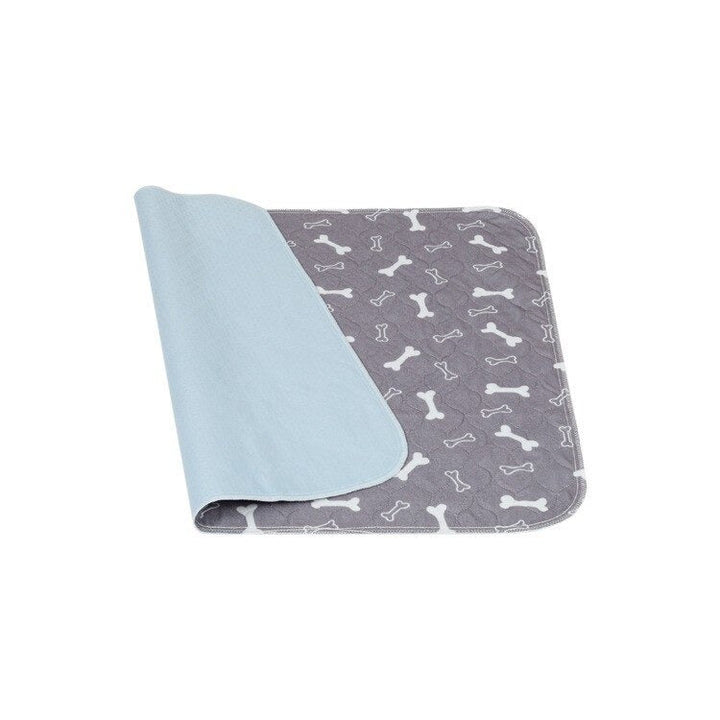 Washable dog training pad with waterproof backing, ideal for puppies and adult dogs