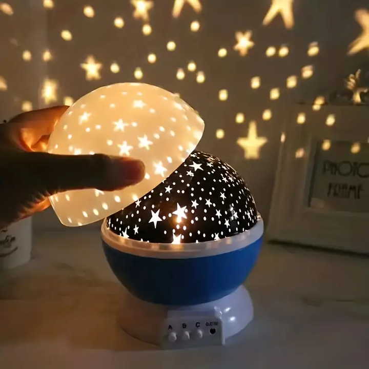 Kids' rotating star projector for bedrooms, providing a gentle LED night light & enchanting space ambiance.