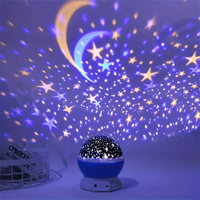 Blue rotating star projector night light illuminating a child's room with soothing LED star patterns.