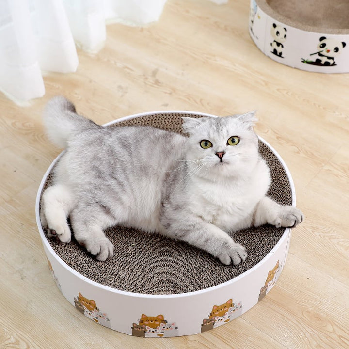 Round cat scratching mat for healthy claws, furniture protection, and pet relaxation. Durable sisal cat toy.