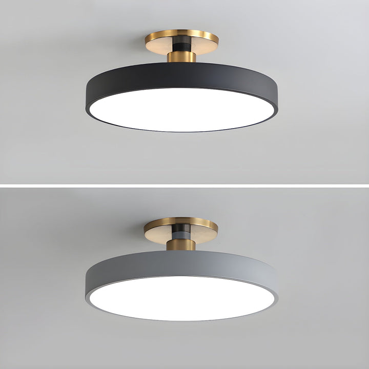Sleek round LED ceiling fixture, ideal flush mount for a contemporary bedroom.