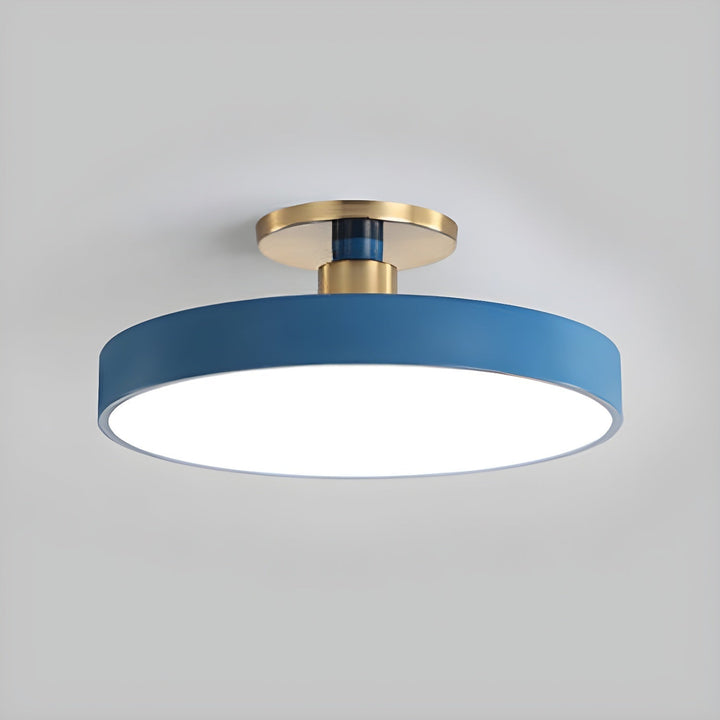Elegant round LED ceiling light, flush mount for a sleek modern bedroom look.
