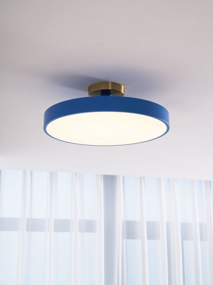 Modern round LED flush mount ceiling lamp, energy-efficient for home decor.