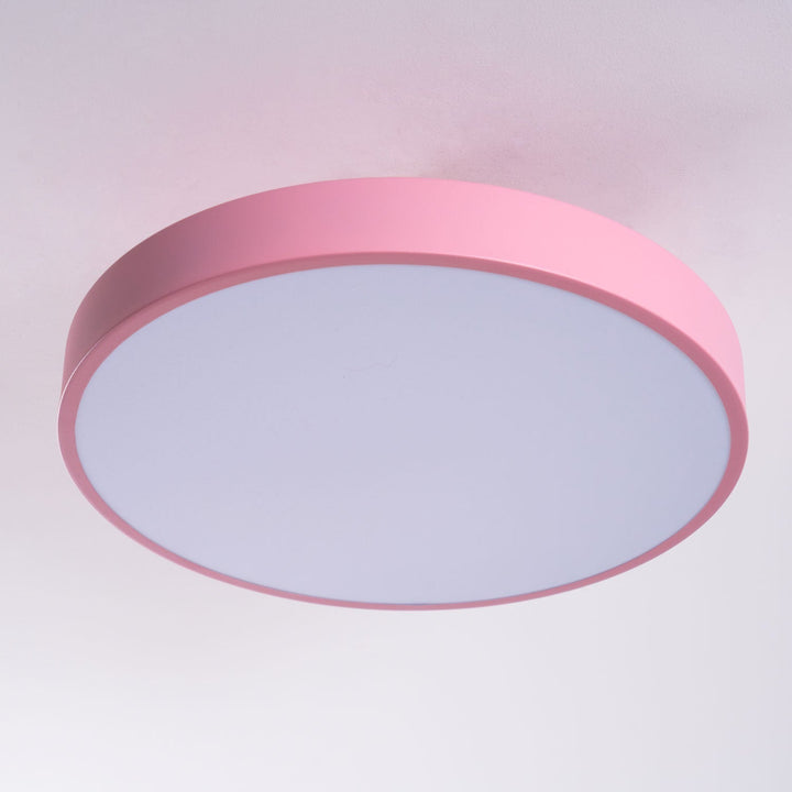 Stylish round LED flush mount, ceiling lamp for modern kitchen lighting.