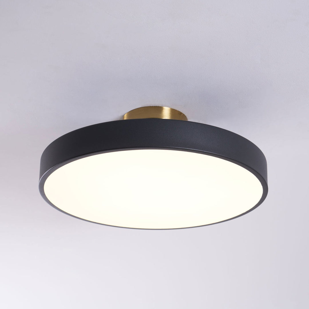 Bedroom round LED flush mount, dimmable ceiling lamp with warm illumination.
