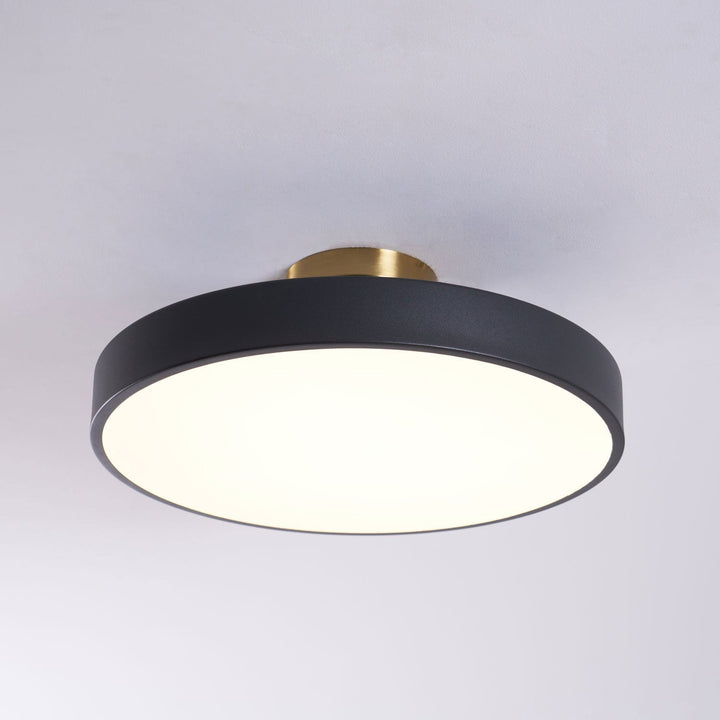 Bedroom round LED flush mount, dimmable ceiling lamp with warm illumination.