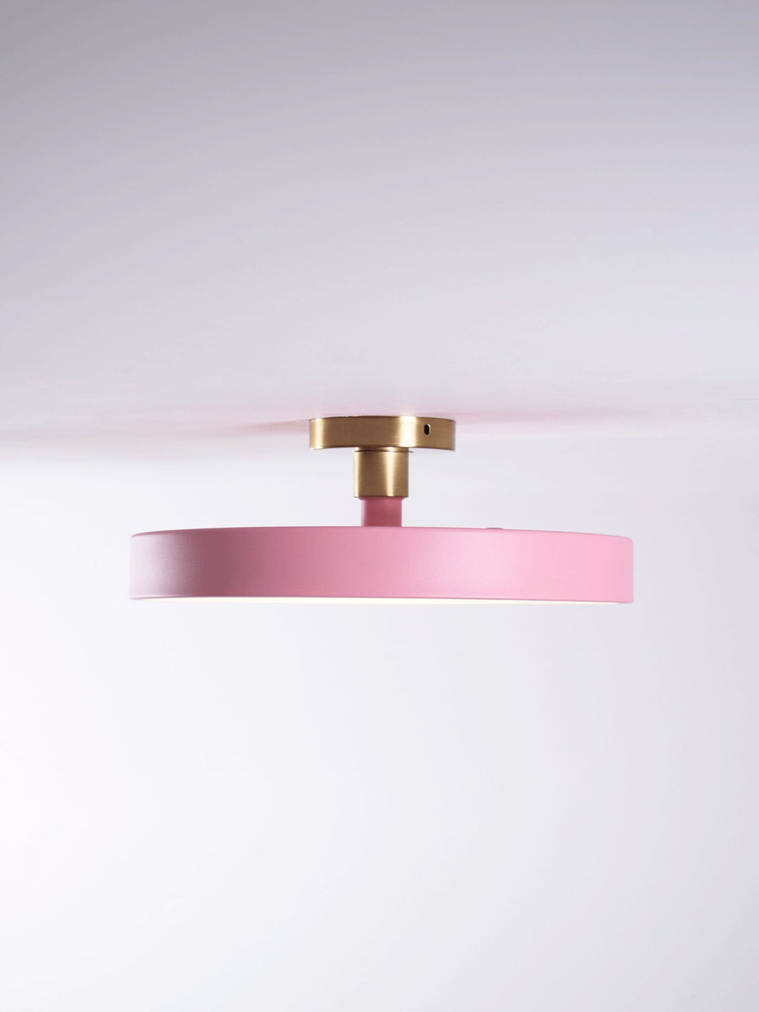 Round LED flush mount ceiling light, a key modern home decor element.