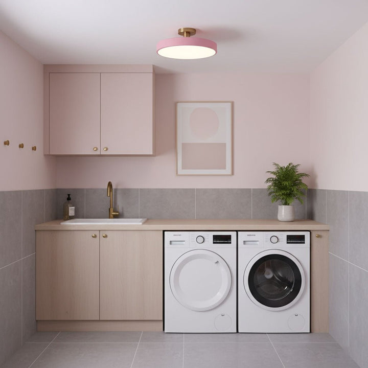 Energy-efficient round LED ceiling lamp, flush mount for living rooms & bedrooms.