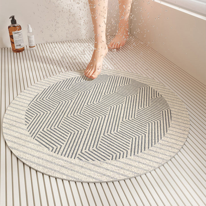 Round non-slip shower mat in light blue, ensuring bathroom safety and easy cleaning for any unisex shower.
