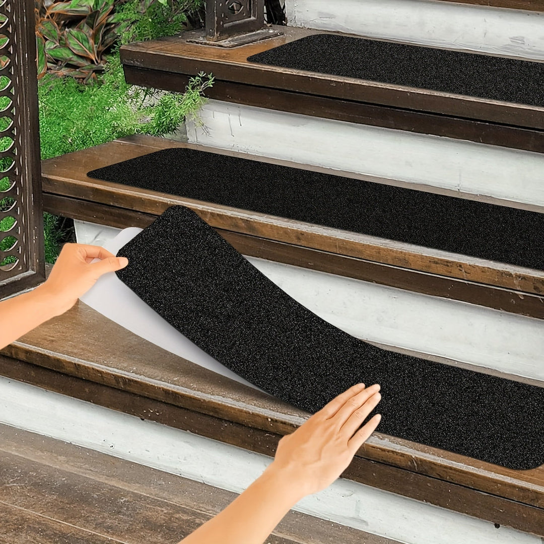 Rubber anti-slip tread strips for stairs, providing extra grip & safety on indoor and outdoor steps.