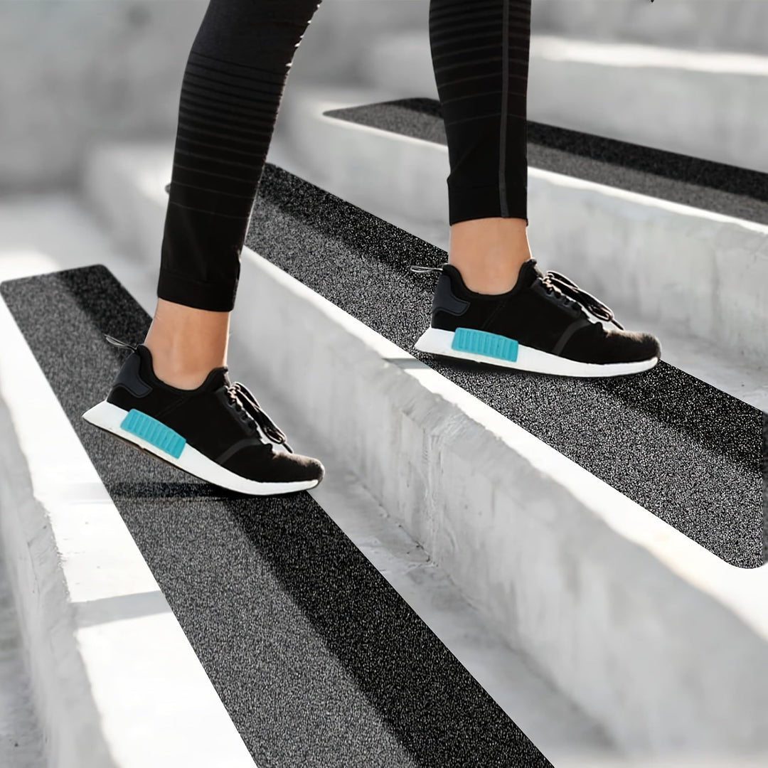 Durable rubber anti-slip tread strips, perfect for enhancing traction on driveways and outdoor walkways.