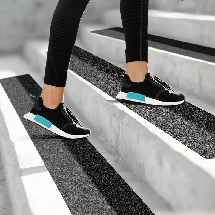 Durable rubber anti-slip tread strips, perfect for enhancing traction on driveways and outdoor walkways.