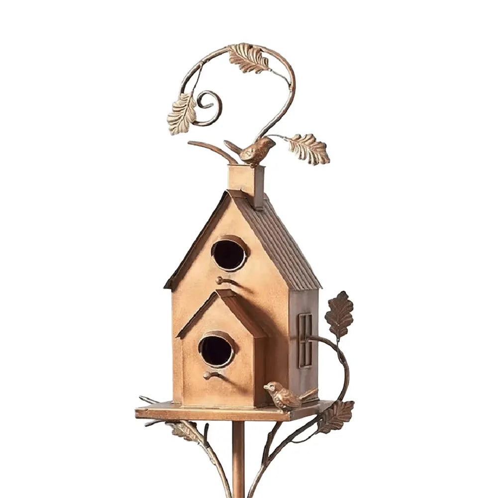 Dual entry metal birdhouse, ideal for garden decoration and bird nesting.