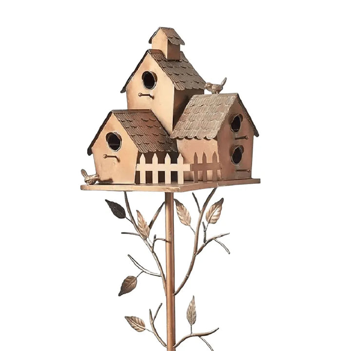 Enhance your garden with this unique dual entry metal birdhouse, rustic style.