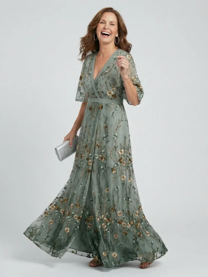 Sage green floral embroidered drop waist maxi dress for women, elegant v-neck & flutter sleeves, perfect for garden parties.