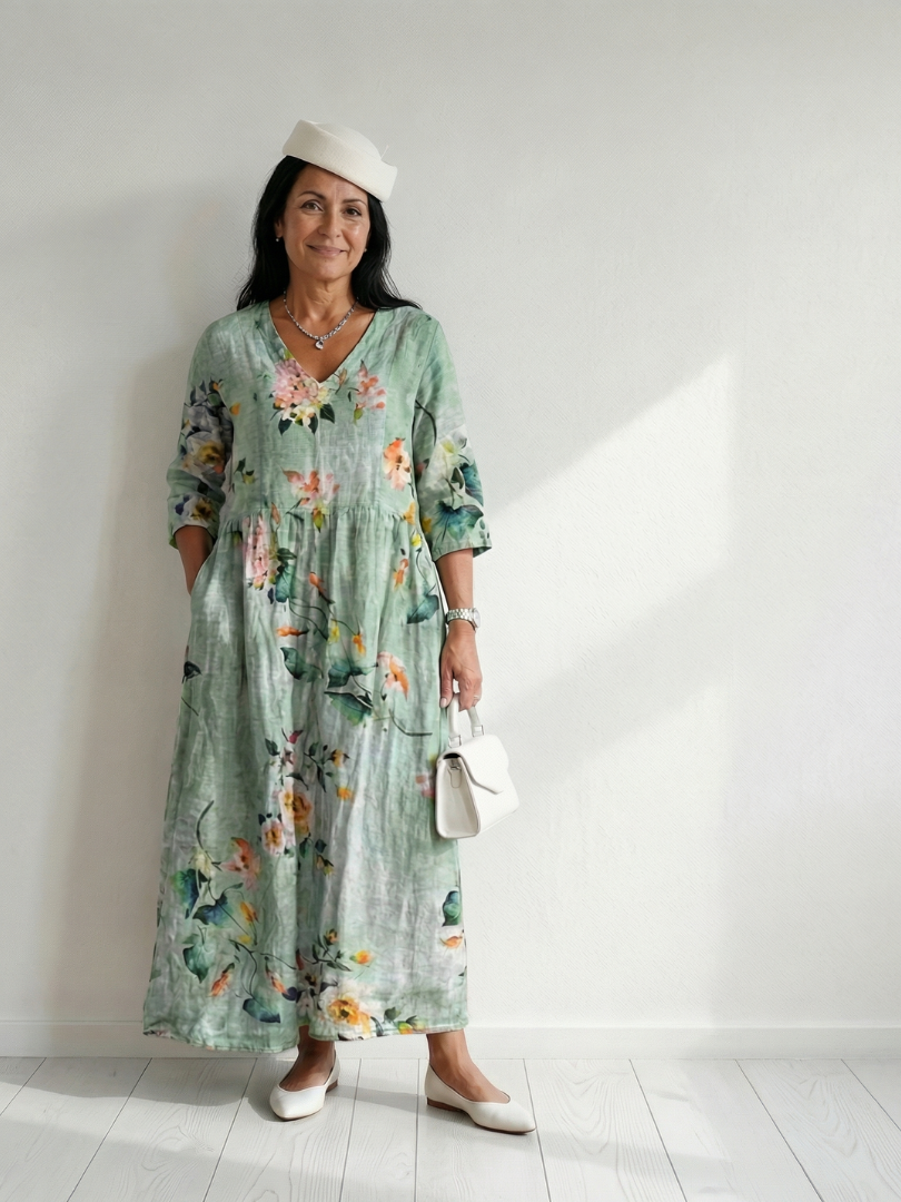 Sage green women's floral midi dress with long sleeves & V-neck, perfect for everyday casual elegance.