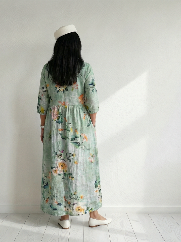 Elegant women's long sleeve V-neck midi dress in a beautiful sage green floral pattern, casual & comfy.