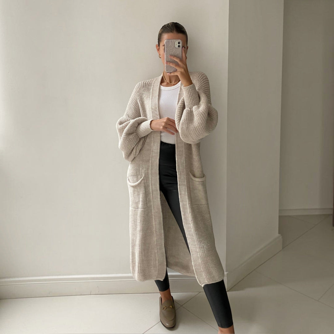 Versatile women's sand longline cardigan, soft knit, elegant bell sleeves for everyday fashion.