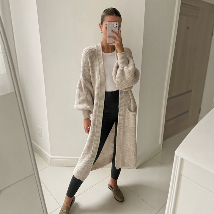 Women's sand longline cardigan with bell sleeves, soft knit, a chic layering piece for any outfit.
