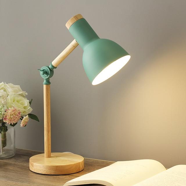Minimalist Scandinavian wooden desk lamp with adjustable arm, perfect for modern home decor.