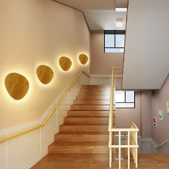 Scandinavian wooden wall lamp with minimalist LED lighting, perfect for Nordic home decor.