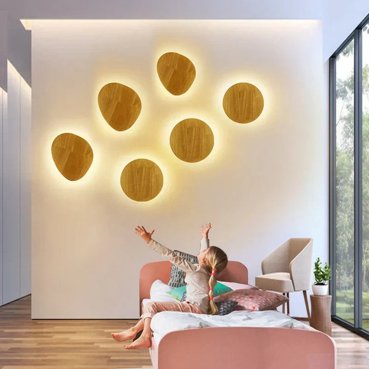 Dimmable Scandinavian wooden wall lamp. Minimalist LED design casts warm, adjustable light for home decor.