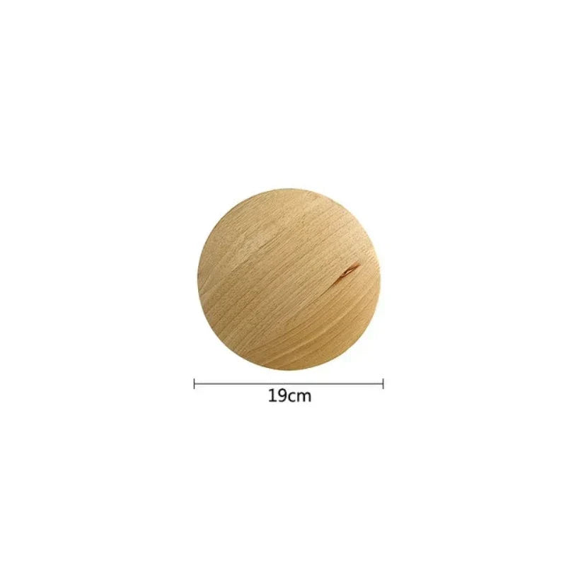Stylish Scandinavian wooden LED wall lamp for modern home decor. Adds warm, minimalist lighting to any space.