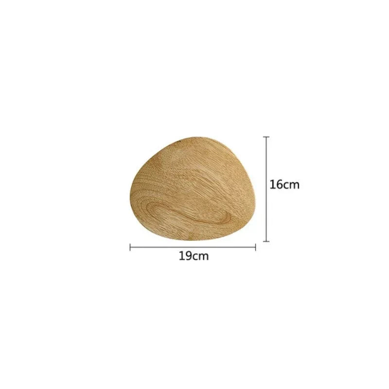 Simple Scandinavian wooden wall lamp with integrated LED, creating warm, minimalist lighting in a modern home.