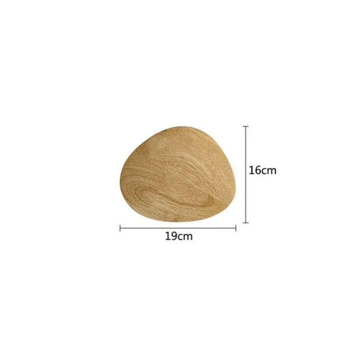 Simple Scandinavian wooden wall lamp with integrated LED, creating warm, minimalist lighting in a modern home.