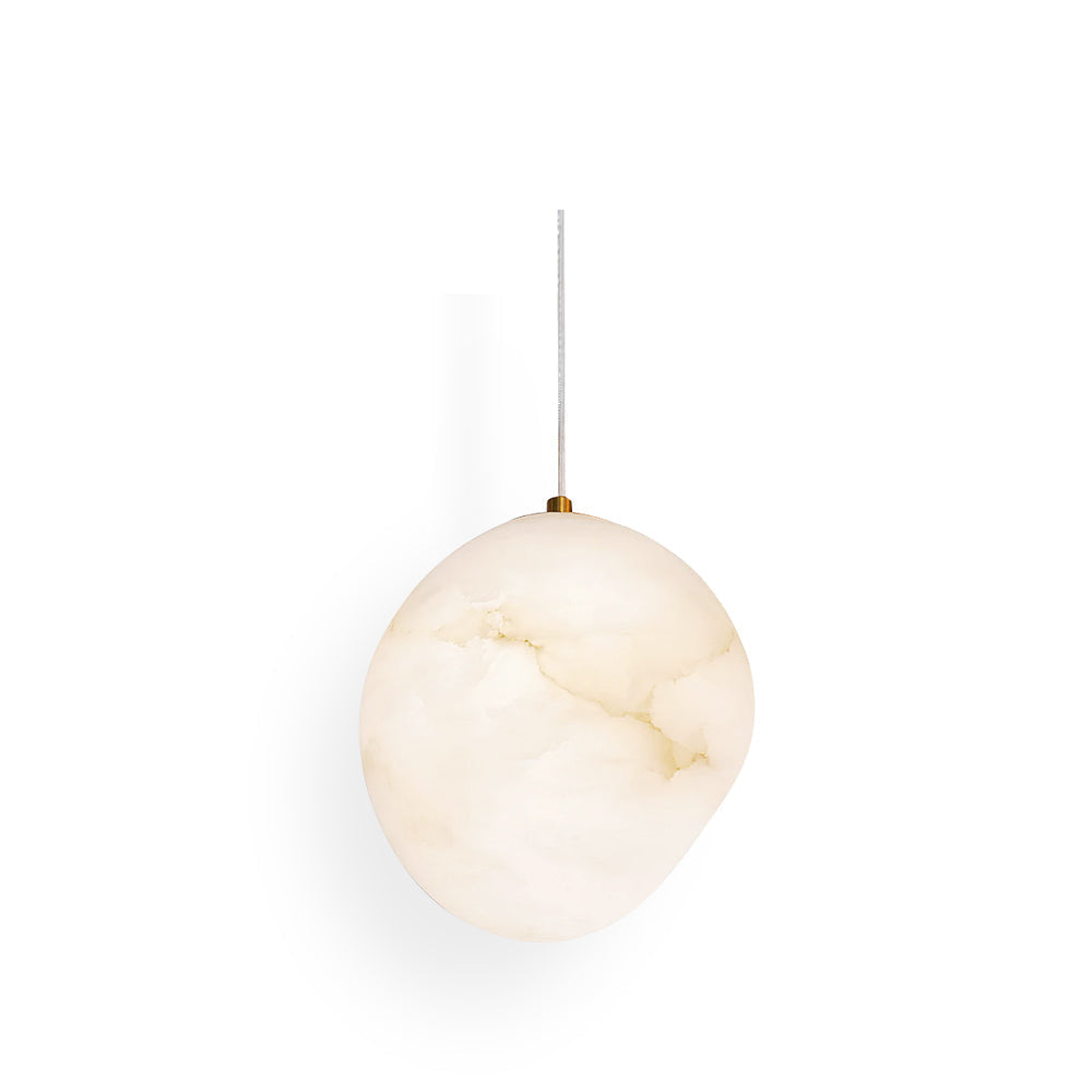 Sculptural pebble pendant light with brass finish, perfect for modern Japandi style serene spaces.