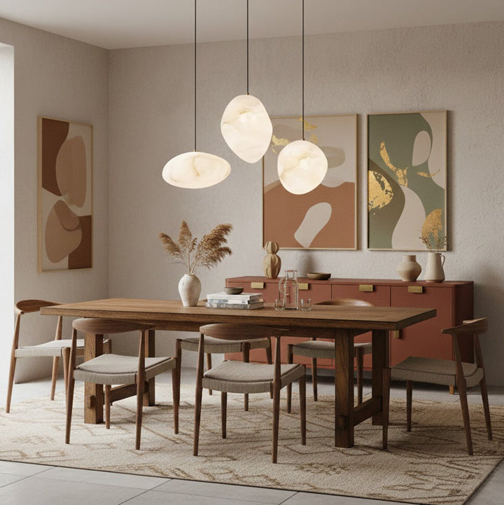 Sophisticated brass sculptural pebble pendant light, ideal for contemporary home decor.