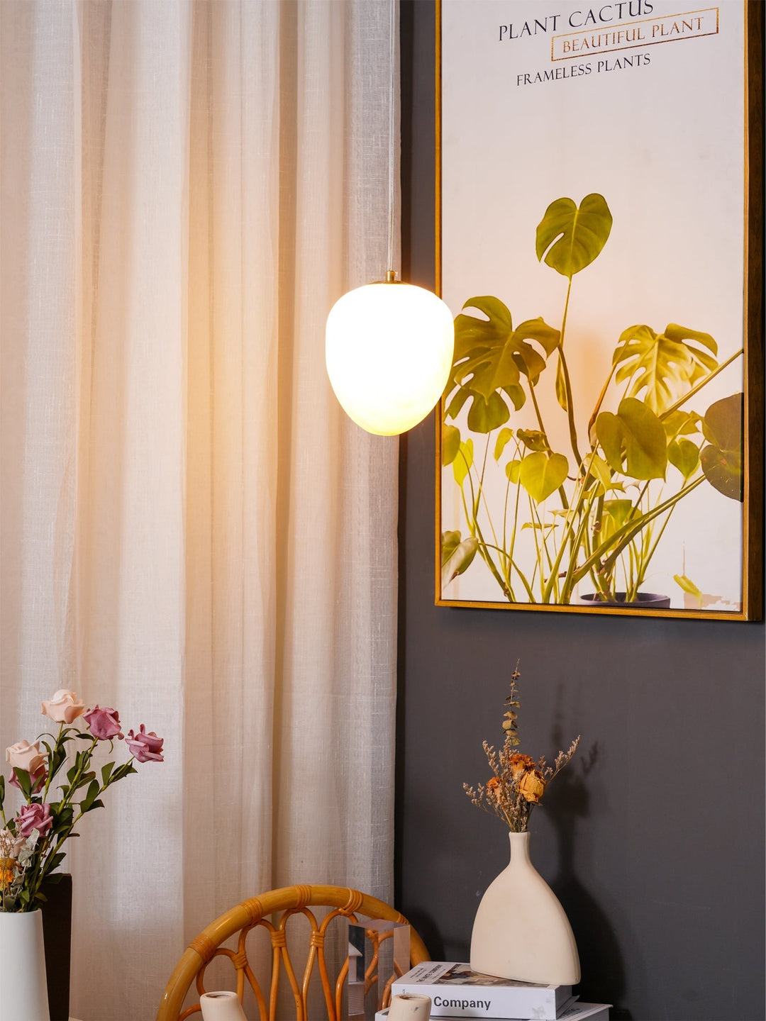 Chic ceiling lamp: brass finish sculptural pebble pendant for a serene and stylish home.