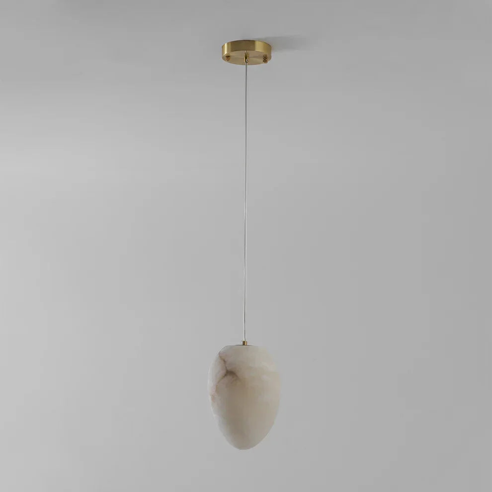 Unique sculptural pendant light, brass, pebble form, perfect for modern Japandi style serenity.
