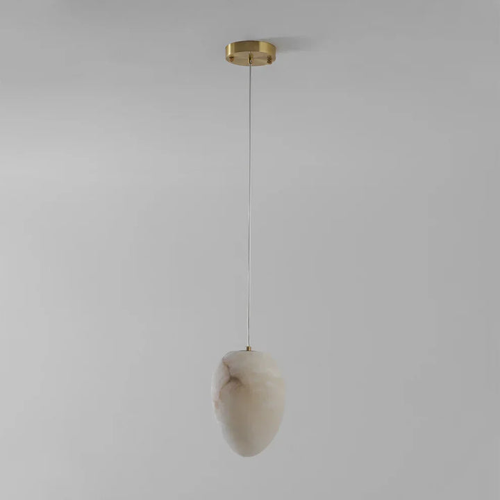 Unique sculptural pendant light, brass, pebble form, perfect for modern Japandi style serenity.