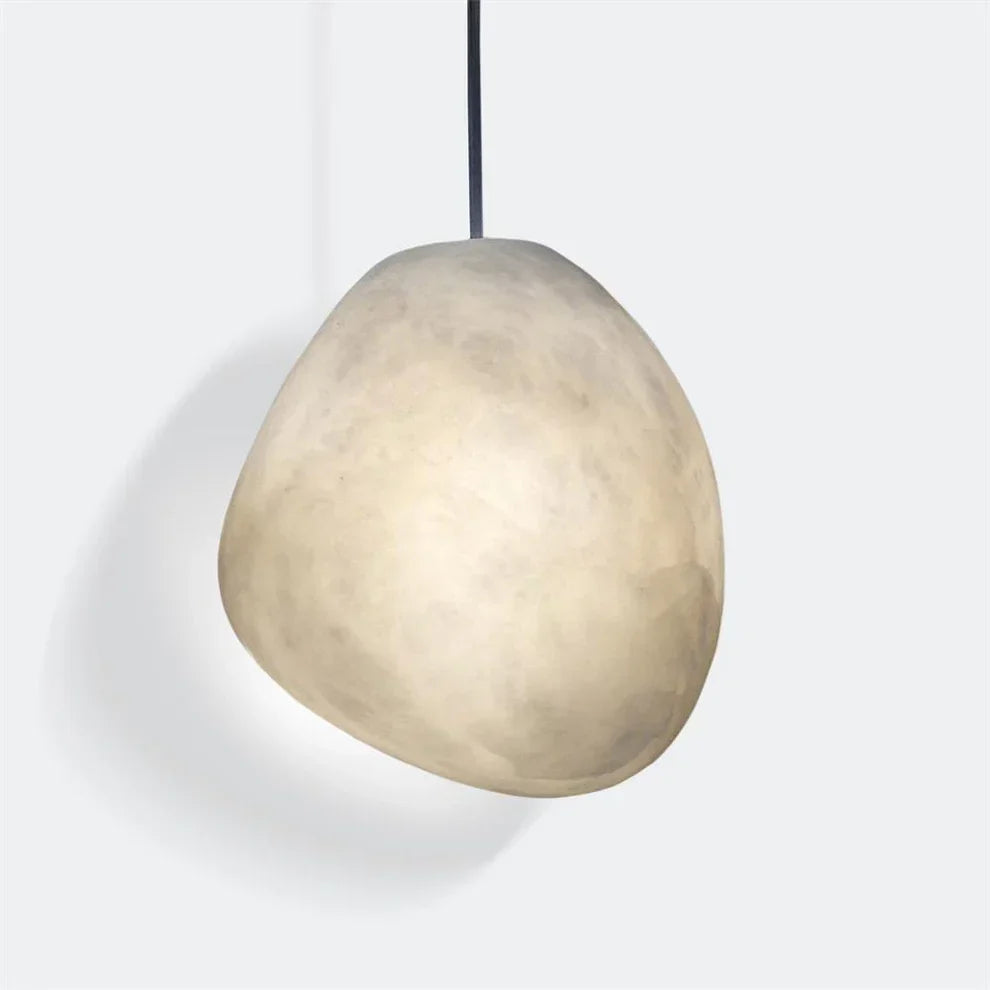 Japandi style modern ceiling lamp, sculptural pebble pendant with a chic brass finish.