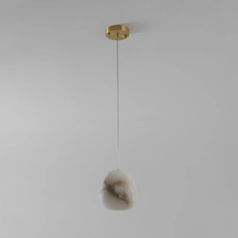 Modern home decor: brass sculptural pebble pendant light, elegant and serene.
