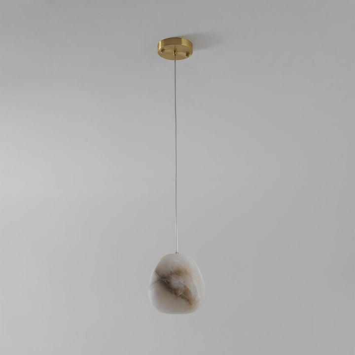 Elegant Japandi style pendant light, brass, sculptural pebble design, perfect for serene homes.