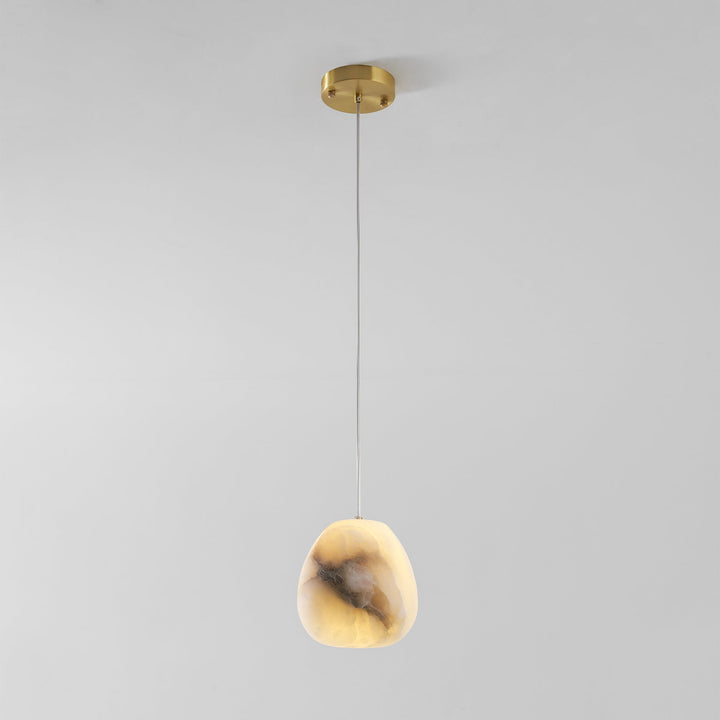 Modern decorative lighting: sculptural pebble pendant, brass finish, a chic ceiling lamp.