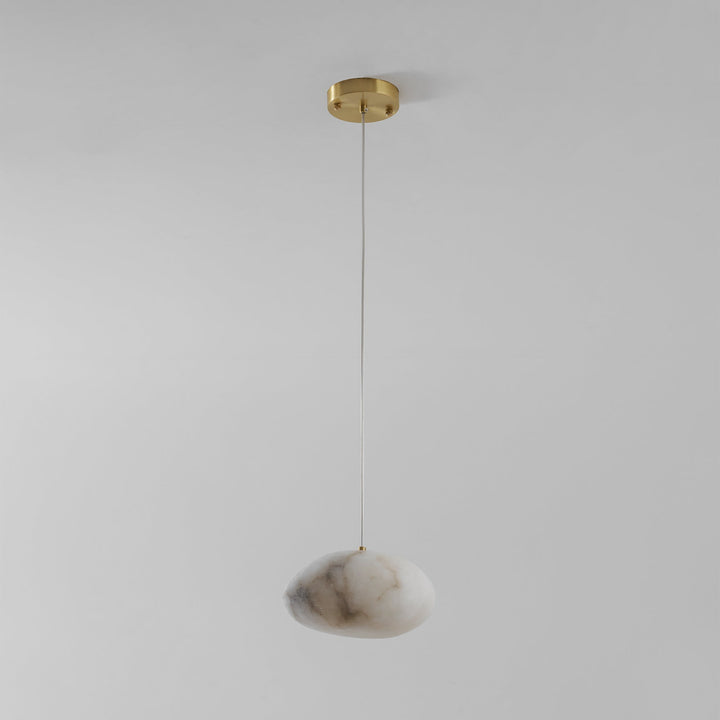 Sculptural pebble pendant light, brass finish, modern ceiling lamp, ideal for home ambiance.