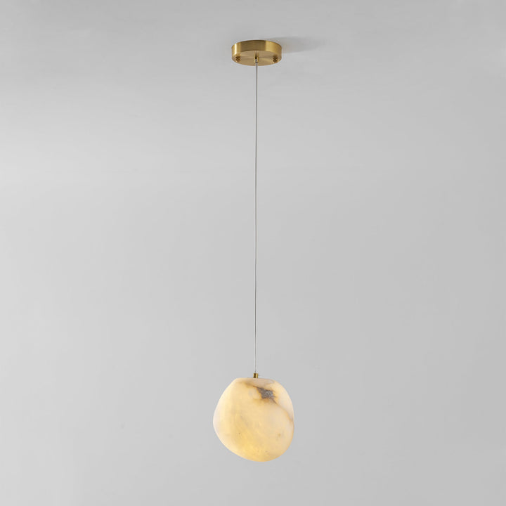 Modern and decorative ceiling lamp, brass sculptural pebble pendant, for serene living.