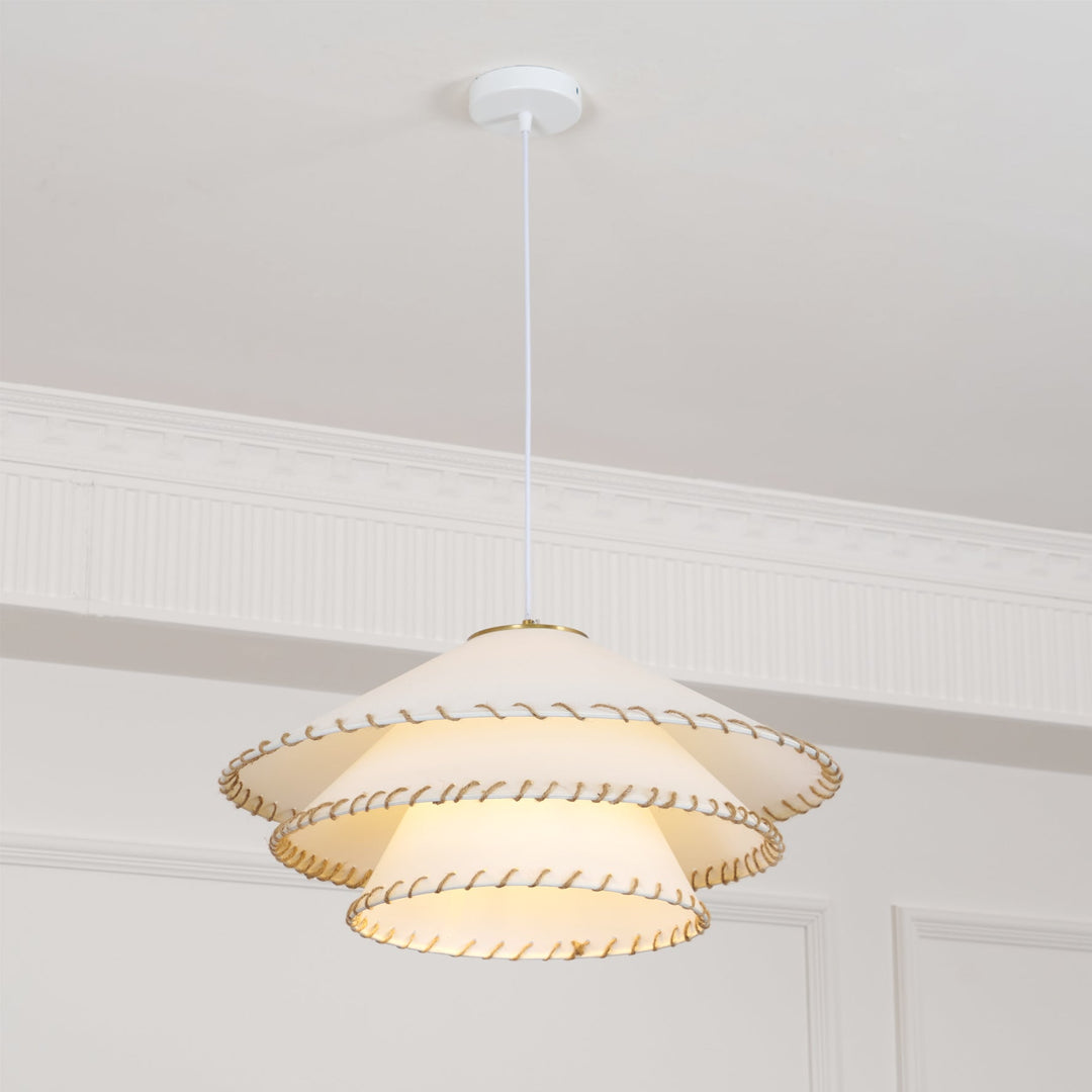 Modern tiered ceiling lamp, sculptural design, warm neutrals, soft ambient glow.