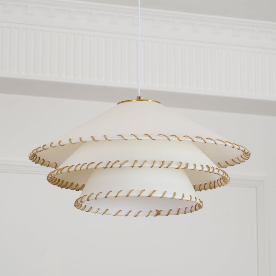 Bohemian pendant light, tiered sculptural, beige, ambient lighting for dining room.