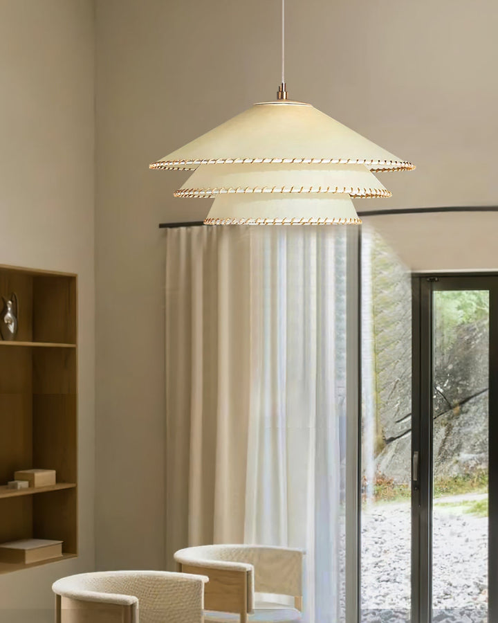 Sculptural tiered pendant light, beige, ambient glow for contemporary entryway.
