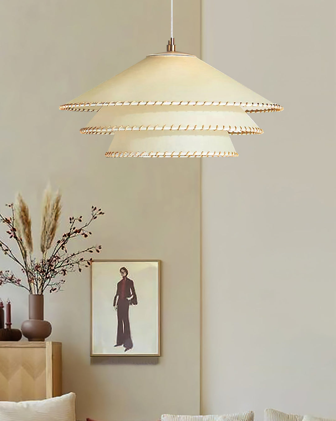 Home decor pendant light, sculptural tiered design, warm neutrals, ambient glow.